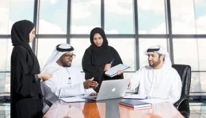 A team of dedicated professionals working together in an office setting.